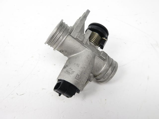 Corps d'injection gauche