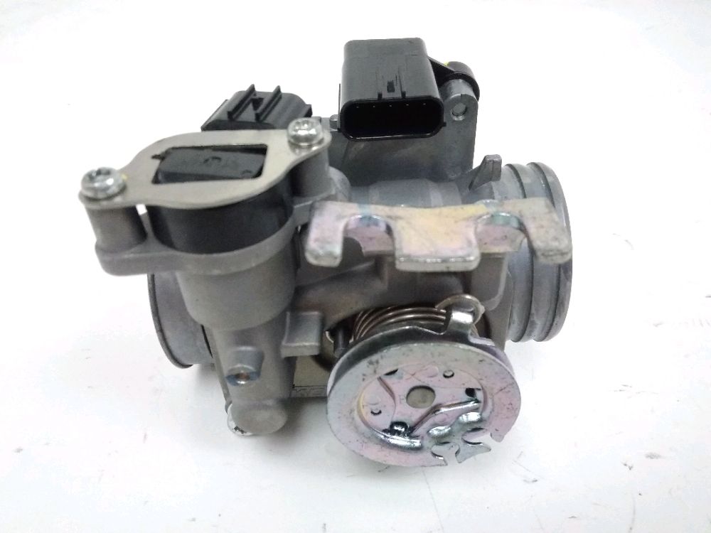 Corps d'injection gauche