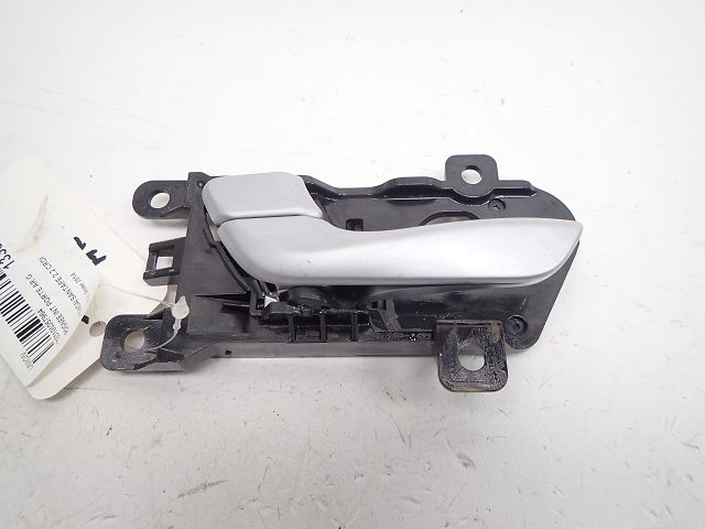 Poignee interieure porte arriere gauche