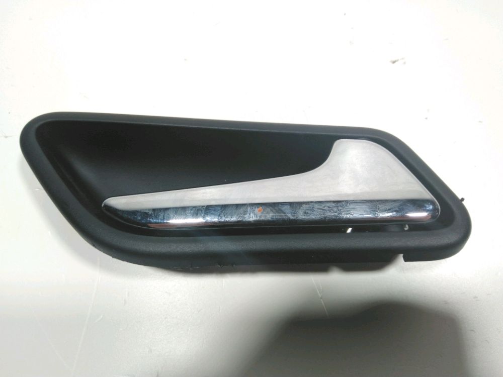 Poignee interieure porte arriere droite