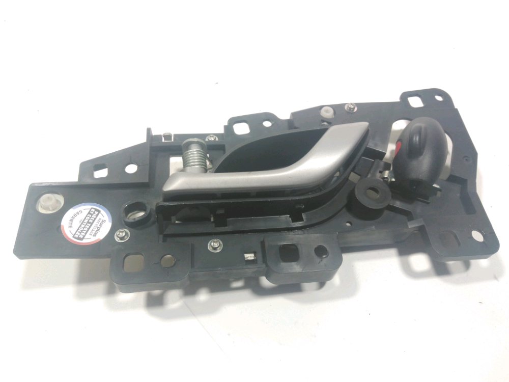 Poignee interieure porte avant gauche