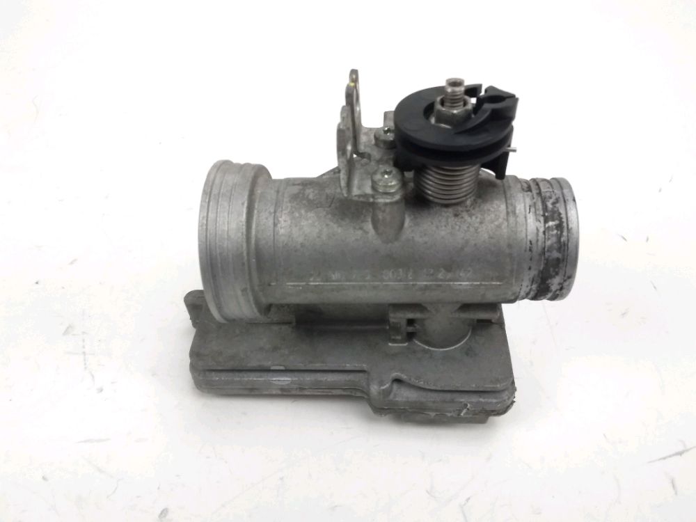 Corps d'injection gauche