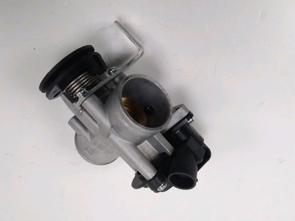 Corps d'injection droit