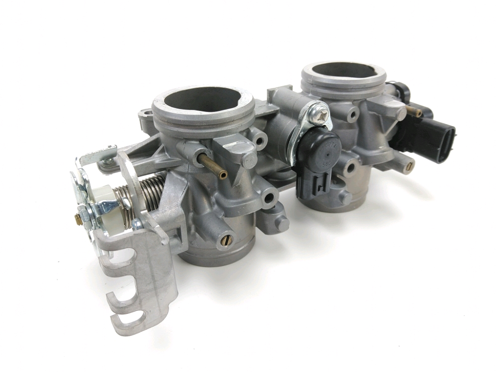 Corps d'injection droit