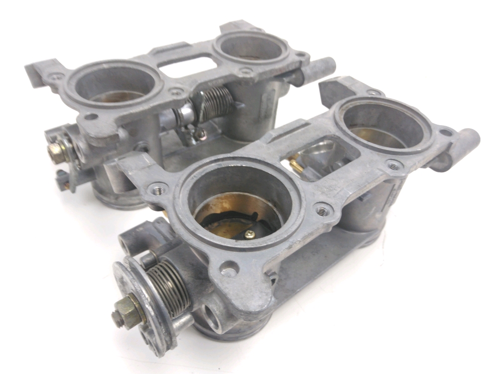 Corps d'injection gauche