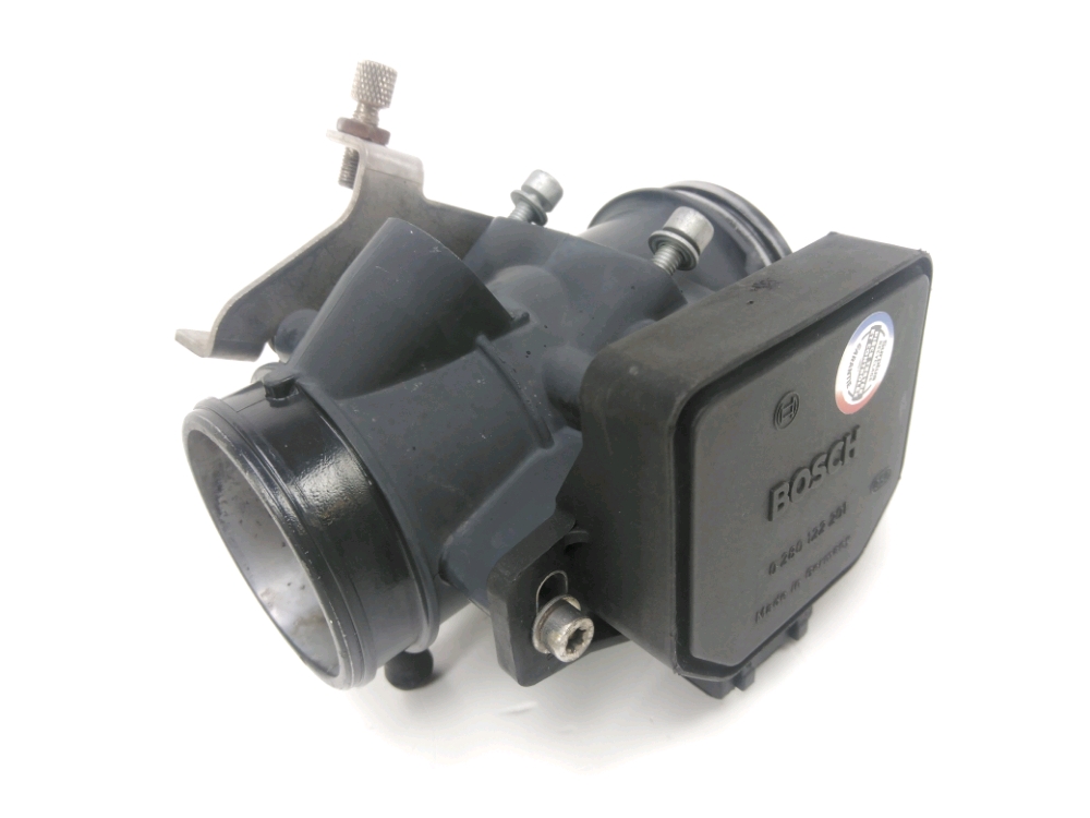 Corps d'injection gauche