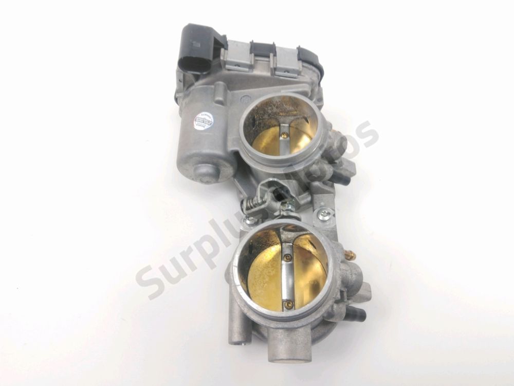 Corps d'injection gauche